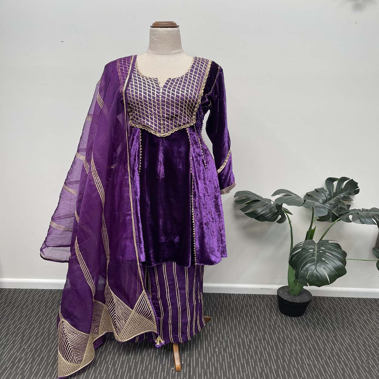 Purple velvet kalidar with dori and gotta embellishment